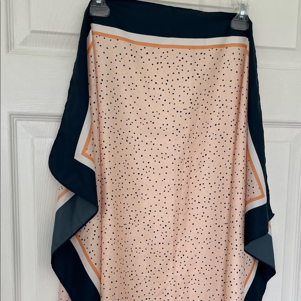 Elegant Polka Dot scarf in peach and navy.

40” x 40”